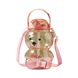 Gourde en plastique ours mignon pour enfants avec paille et sangle grande capacité rose.