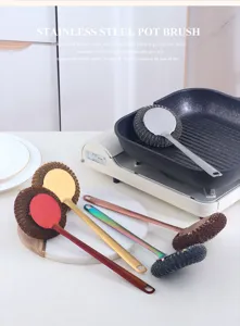 Detail view of stainless steel pot brush in kitchen scene, durable wire cleaning tool