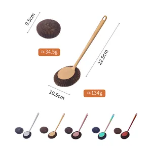Long-handled cleaning brush with replaceable scrubber head for efficient kitchen and pot washing.