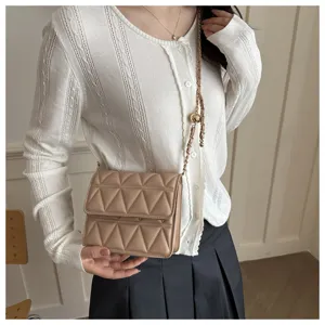 Chic quilted crossbody bag for women with stylish chain strap and metal ball adjuster.