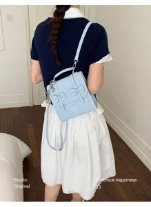 Zaino coreano elegante con fiocco da donna, borsa casual in ecopelle PU azzurro chiaro.