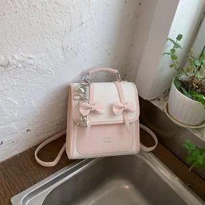 Zainetto carino rosa e bianco da donna, borsa da viaggio casual in pelle per pendolari.