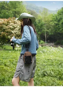 Outdoor multi-functional cross-body chest bag for hiking, travel, and urban usage.