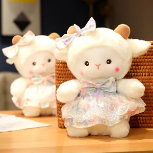 Cute sheep plush toy detail, soft stuffed lamb doll with dress, perfect gift for kids.