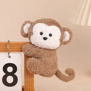 Cute brown monkey plush toy doll, soft hanging clip animal companion toy for office decor.