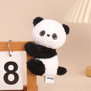 Cute panda plush clip toy stuffed animal hanging doll for office desk and study companion.