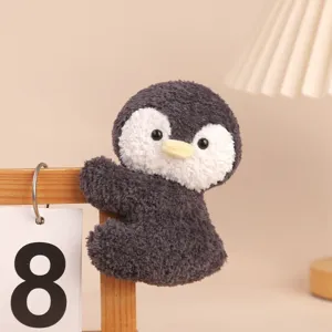 Cute plush penguin clip doll, soft stuffed toy for desk calendar decoration and companion.