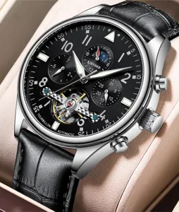 Reloj mecánico automático para hombre KINYUED con correa de piel negra y tourbillon.