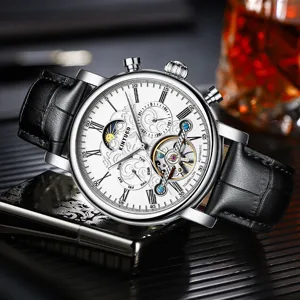 Reloj de pulsera mecánico automático para hombre con esfera esqueleto y correa de cuero negro.