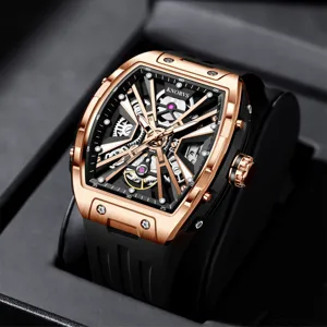 Reloj mecánico automático de lujo en oro rosa para hombre con esfera esqueleto y correa negra.