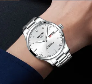 Reloj mecánico automático plateado de lujo para hombre con correa de acero inoxidable.