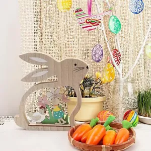 Detailed view of wooden Easter rabbit cutout ornament with decorative carrots and festive eggs.