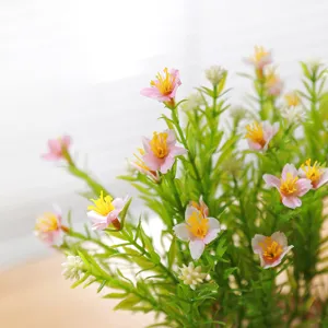 Artificial pink flowers simulation green plant detail shot for Nordic home indoor decor.