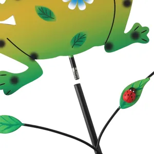 Metal garden stake detail showing assembly joint and decorative leaf ornament.