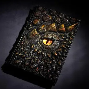 Vintage 3D dragon eye resin notebook, mysterious embossed gothic journal for fantasy lovers.