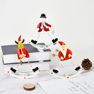 Christmas metal rocking snowman reindeer Santa ornament holiday tabletop decoration set.