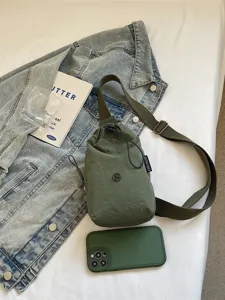 Casual nylon drawstring sling bag for daily commute, solid color minimalist crossbody phone bag.