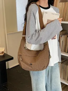 Stylish nylon waterproof plaid dumpling crossbody bag for women, casual commuter shoulder bag.