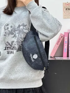 Stylish embroidered canvas fanny pack, versatile chest bag for travel and outdoor sports.
