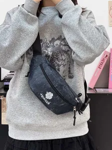Detail view of the stylish embroidered waist bag, lightweight outdoor chest bag for travel.