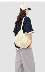 Detailed showcase of casual yellow plaid shoulder tote bag for daily commute use