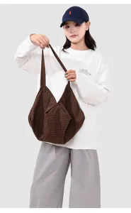 Casual brown plaid tote bag detail view, large capacity shoulder bag for daily commuting and school use.