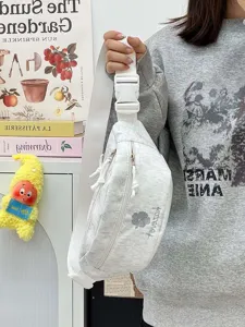 Casual grey canvas waist bag with embroidery flower and adjustable strap for daily outdoor travel.