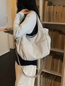 Minimalist nylon shoulder crossbody bag, casual large capacity daily casual handbag with pockets.