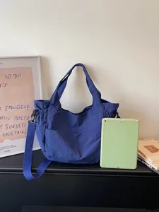 Korean style solid nylon waterproof casual large capacity shoulder crossbody tote bag for daily use.
