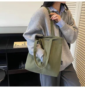 Casual green corduroy tote bag for women, large capacity shoulder bag for daily commute and school.