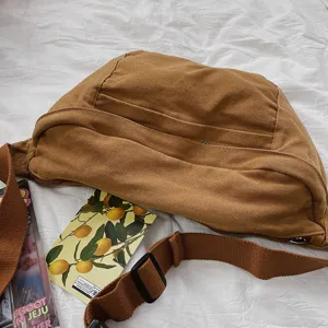 Retro solid canvas chest bag, casual large capacity crossbody bag for women and students.