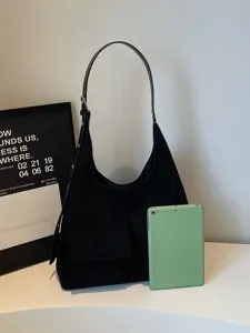Black suede hobo shoulder bag for women, large capacity vintage tote with front pockets.