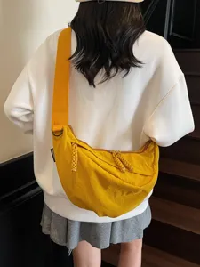 Korean style simple casual crossbody dumpling bag, yellow nylon shoulder bag for women commuting.