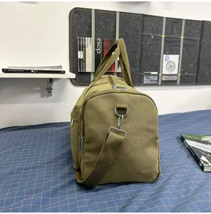Green canvas travel duffle bag, waterproof gym bag with shoulder strap for daily use.
