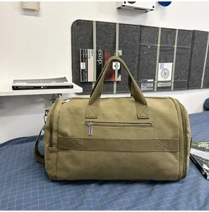 Detailed view of the canvas travel duffel bag, showing durable fabric and large capacity.