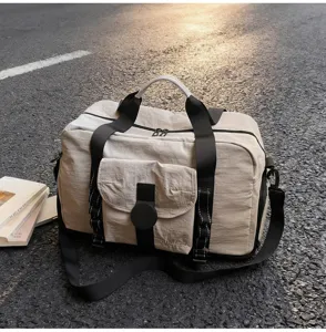 Expandable large capacity travel duffel bag for women, lightweight gym and sports weekend bag.