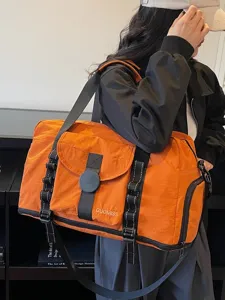 Expandable large capacity travel duffel bag for women, lightweight sports fitness gym bag.