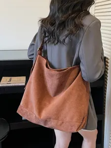 Stylish slouchy tote shoulder bag for women, large capacity casual commute handbag.