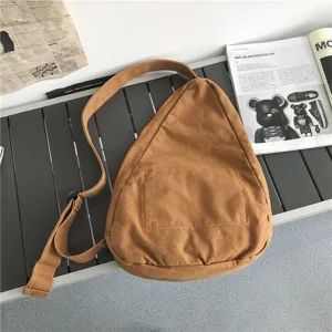 Sac bandoulière décontracté en toile en forme de goutte avec sangle réglable et poche avant.