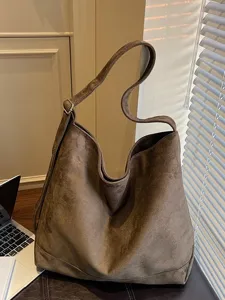 Brown suede hobo tote bag, large capacity slouchy commuter shoulder bag for women daily use.