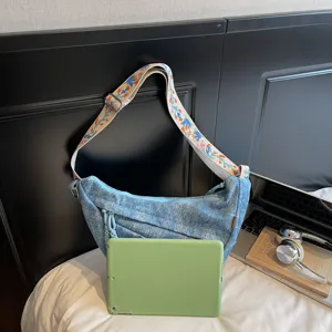 Casual denim crossbody bag with wide colorful strap, stylish street style large capacity.