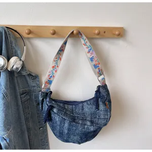 Casual denim shoulder bag with embroidered strap, stylish crescent hobo crossbody bag for daily.