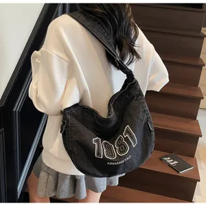 Vintage denim shoulder bag for women, casual crossbody tote with large capacity for commuting.