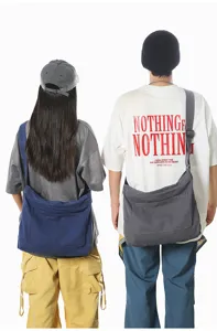 Stylish canvas shoulder bag with large capacity, casual crossbody bag for commute and travel.