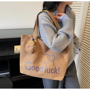 Casual canvas tote bag for women large capacity shoulder bag with cute bear print and mini pouch.