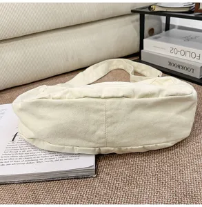 Borsa a tracolla in tela casual dettaglio, borsa dumpling versatile per donna.