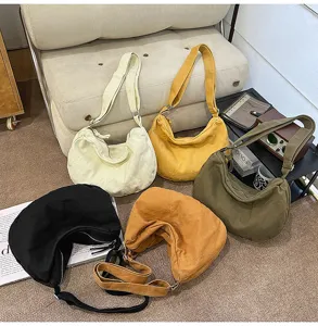 Borsa a tracolla casual in tela da donna, grande borsa a secchiello per l'uso quotidiano.