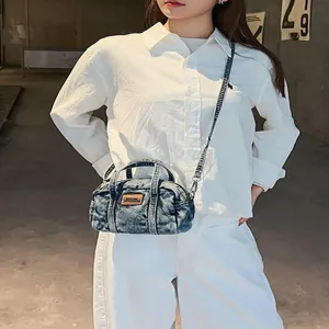Vintage denim casual handbag for women, retro stylish shoulder and crossbody bag.
