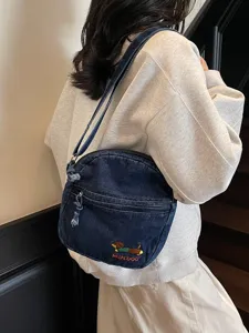 Sac a bandouliere en denim avec broderie teckel, sac decontracté stylé pour les voyages quotidiens.