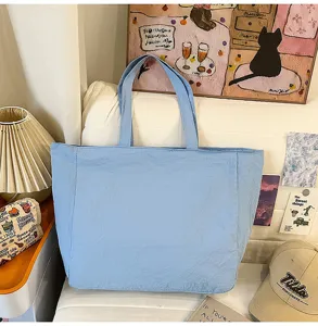 Bolso tote de nailon azul claro de gran capacidad, bolso de hombro casual para el día a día.